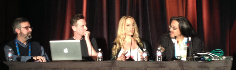 A picture of Warren Spector, Richard Lemarchand, Brenda Romero and John Romero at the GDC 2014 "triple-A academics" panel.