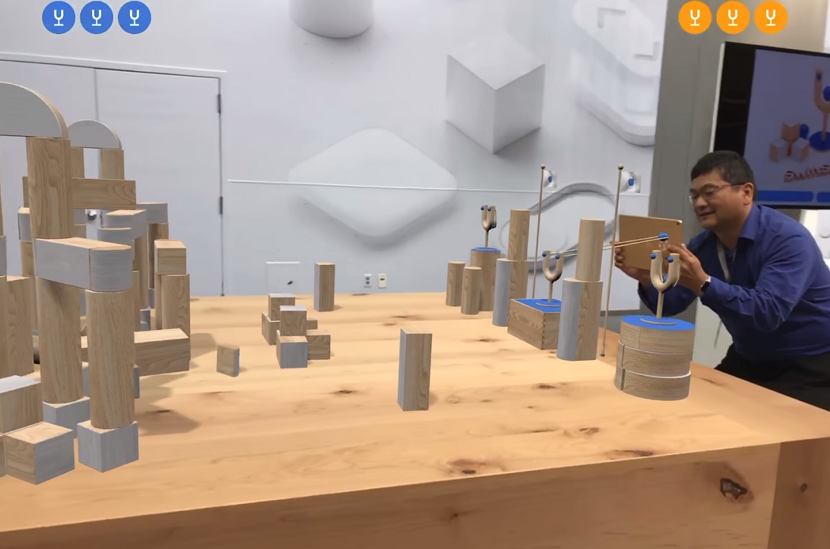 Dean Takahashi of GamesBeat plays Apple's Swift Shot augmented reality game.