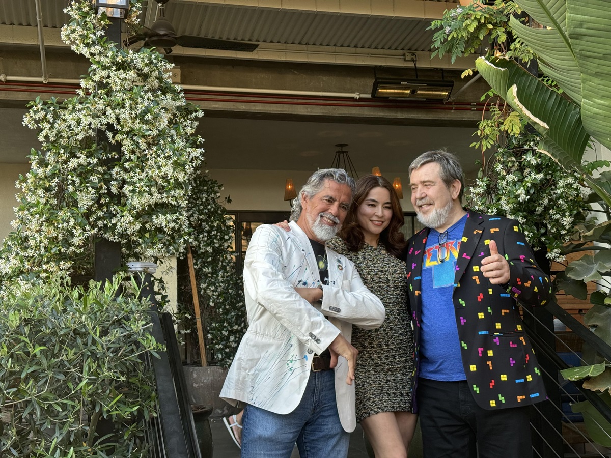 Henk Rogers, Maya Rogers and Alexey Pajitnov.
