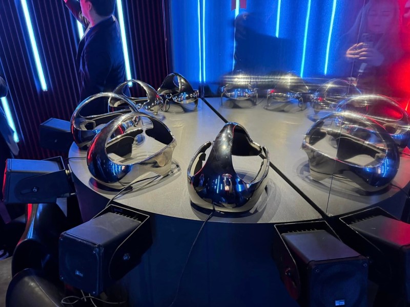 Inside the booth are mysterious VR headsets.