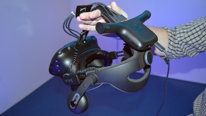 HTC's Vive Wireless Adapter mounted on the original Vive.