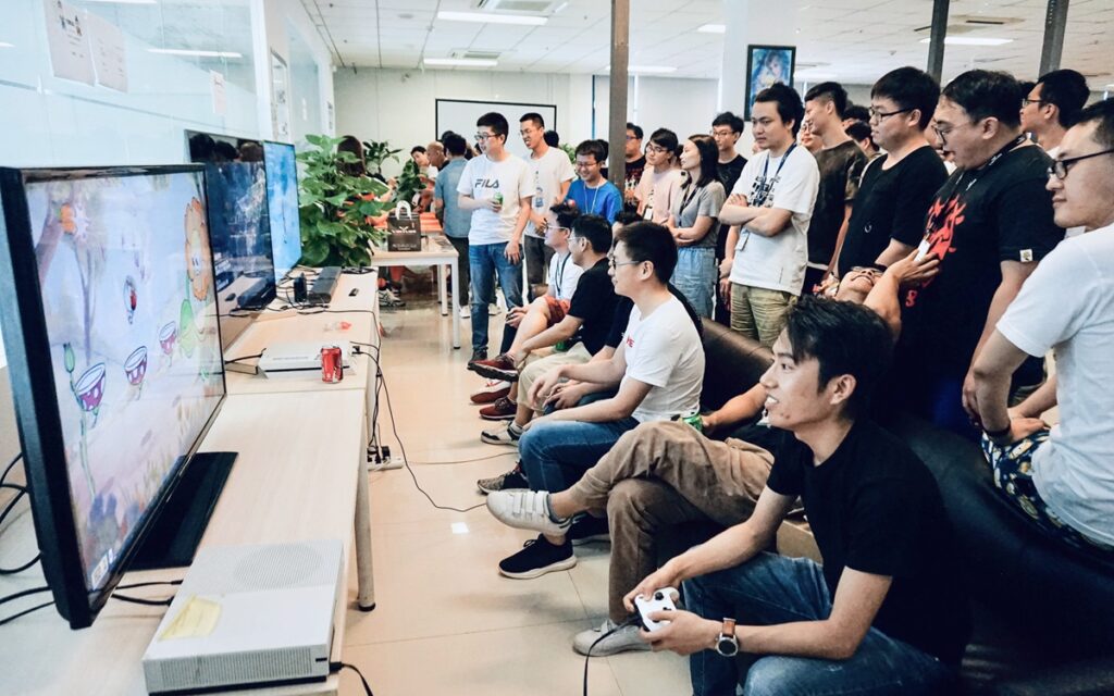 Virtuos employees playing games together.
