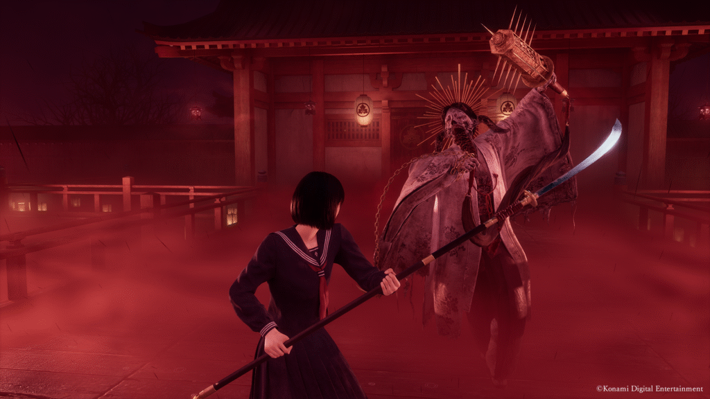 Fighting a horrifying monster in Silent Hill f